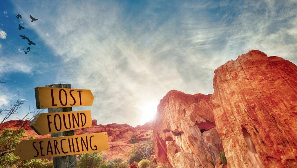 The Arizona desert with a lost, found and searching sign symbolizing the desire to discover one's dreams. 